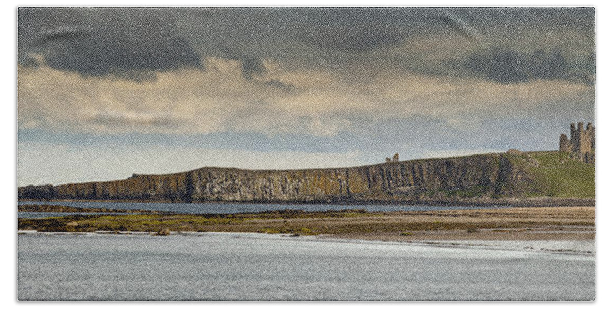 Cloud Hand Towel featuring the photograph Dunstanburgh Castle On A Hill Under A by John Short