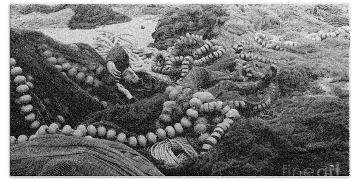Fishing Nets Hand Towel featuring the photograph Fisherman Sleeping on a Huge Array of Nets by Tom Wurl