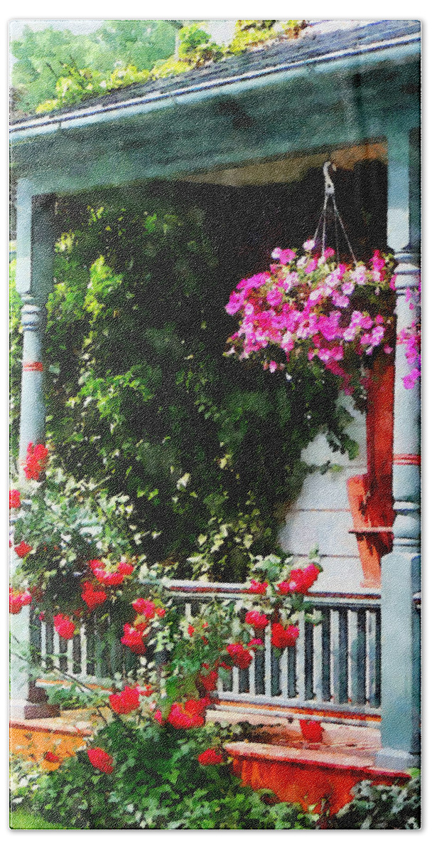 Hanging Baskets Bath Towel featuring the photograph Hanging Baskets and Climbing Roses by Susan Savad