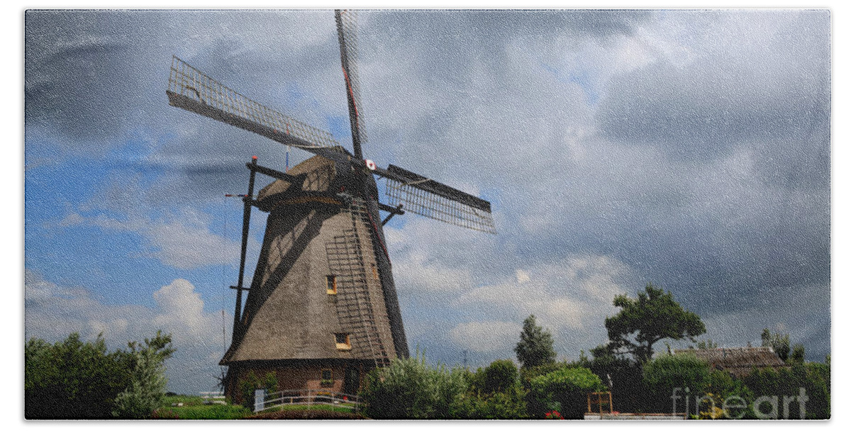 Windmill Hand Towel featuring the photograph Kinderdijk windmill by Louise Heusinkveld