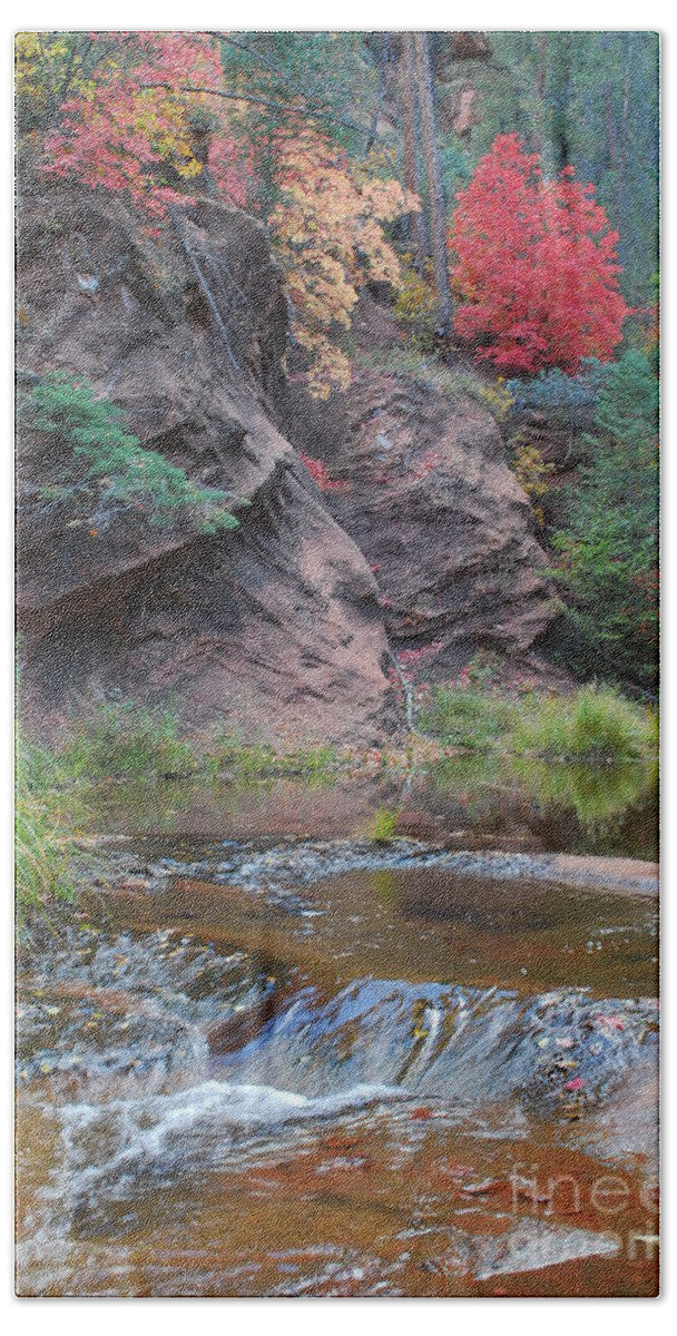 Sedona Hand Towel featuring the photograph Rainbow of the Season and River over Rocks by Heather Kirk