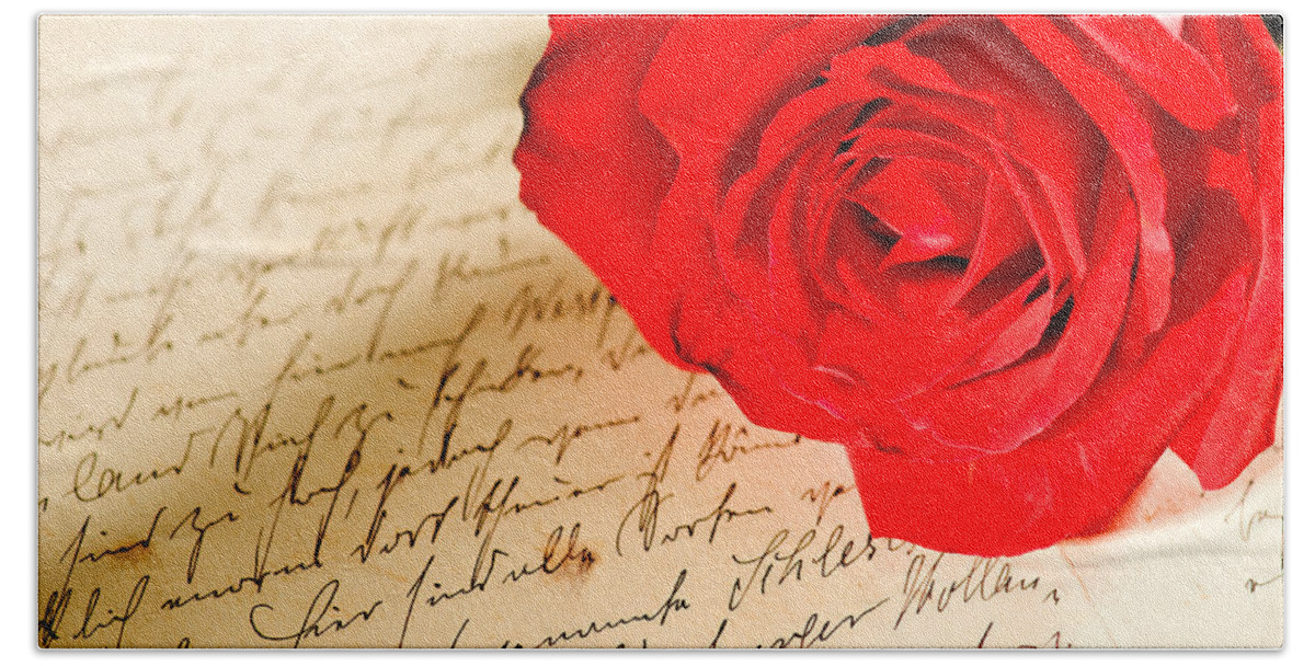 Alliance Bath Towel featuring the photograph Red rose over a hand written letter by U Schade