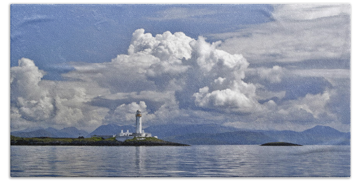 Lighthouse Hand Towel featuring the photograph Summer clouds over Lismore lighthouse by Gary Eason
