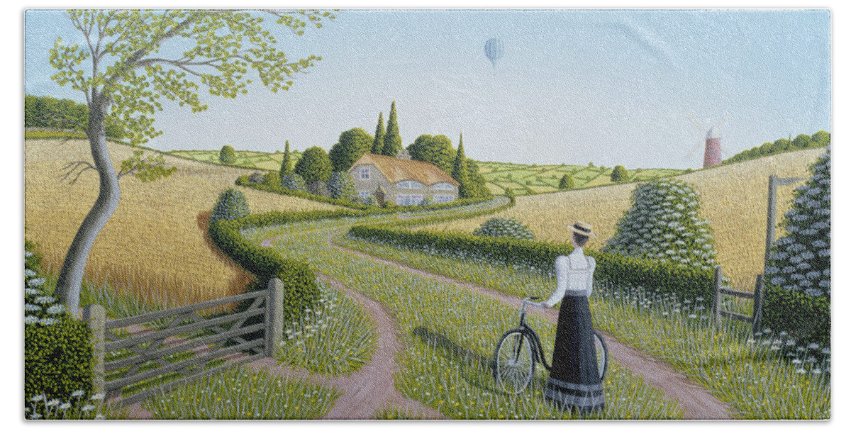 Naive; Landscape; Edwardian; Hot Air Balloon;female; Bicycle; Windmill; Rural; Bucolic; Country Lane;gate; Cornfield; Thatched Cottage; Woman; Dress; Hat; Green; Grass; Grassy; Flower; Flowers; Bush; Bushes; Tree; Trees; Corn; Field; Fields; Cottage Hand Towel featuring the painting Summer Cycling by Peter Szumowski