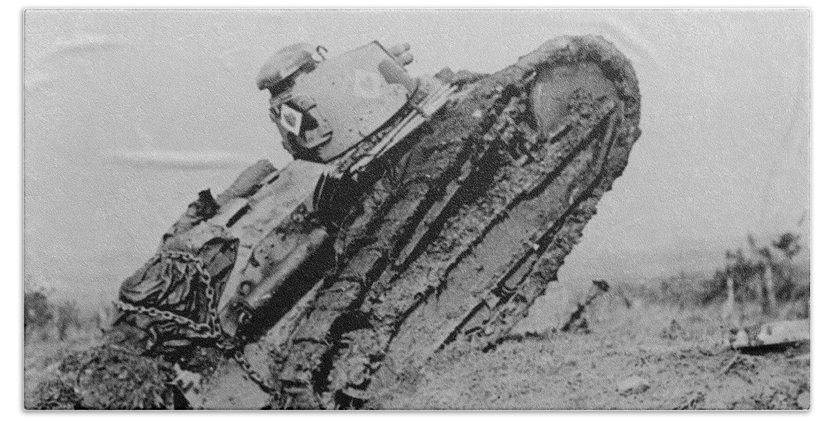 \world War I\ Bath Towel featuring the photograph Tank ploughing its way through a trench and starting toward the German line during World War I by International Images