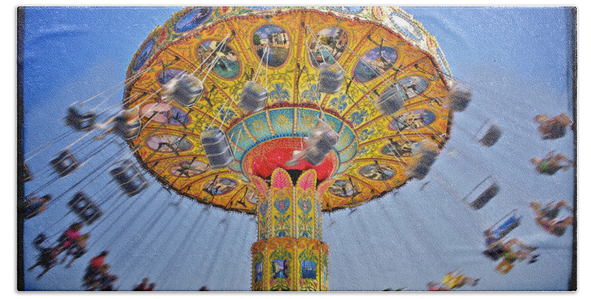 Air Bath Towel featuring the photograph The Carnival Swings by Jarrod Erbe