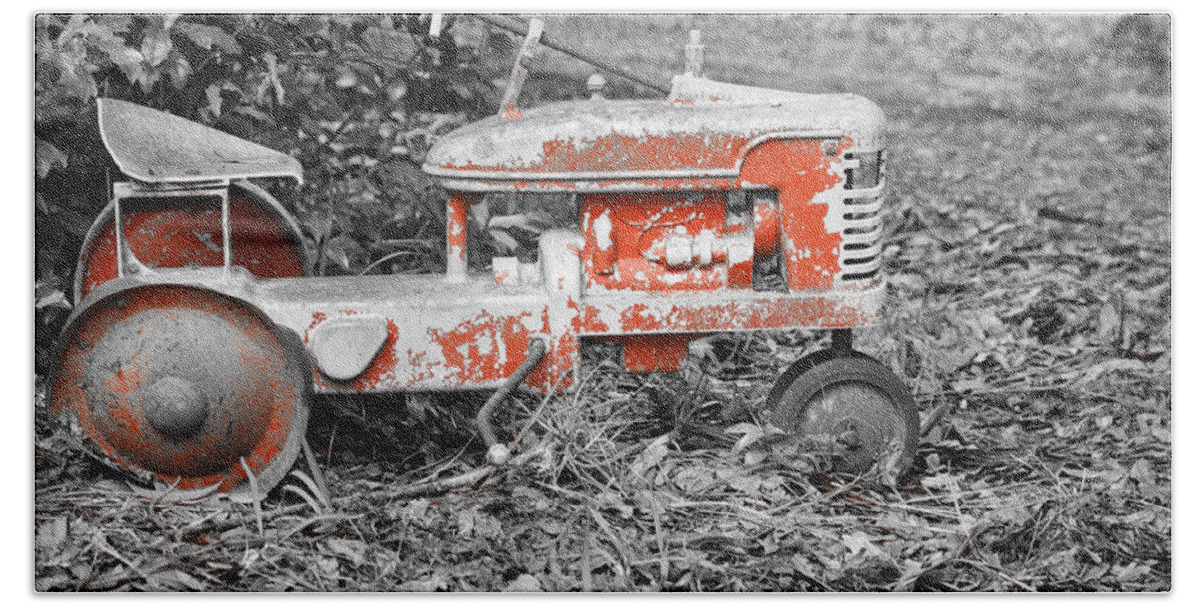 Pedal Tractor Hand Towel featuring the photograph Vintage Red Pedal Tractor by Carolyn Marshall