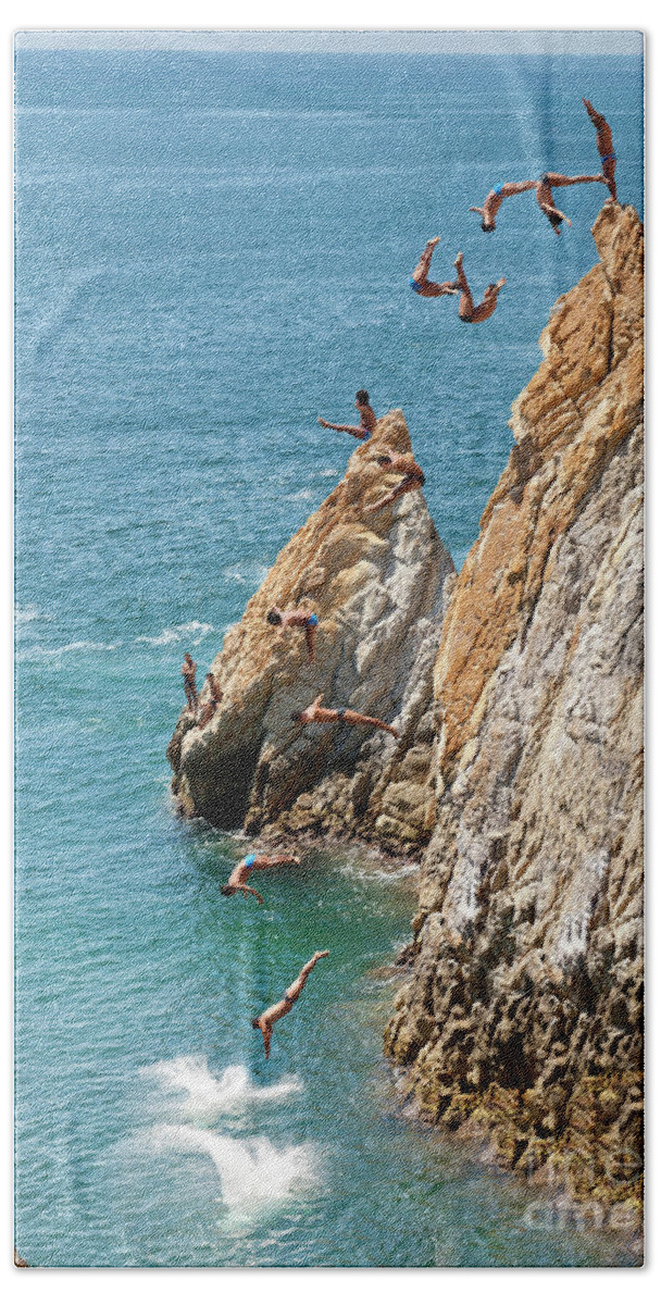 Cliff Divers Hand Towel featuring the photograph Famous cliff diver of Acapulco Mexico #1 by Anthony Totah