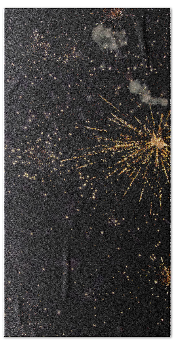 Black Hand Towel featuring the photograph Shining Colorful Firework Over A Dark Night Sky #1 by Gina Koch