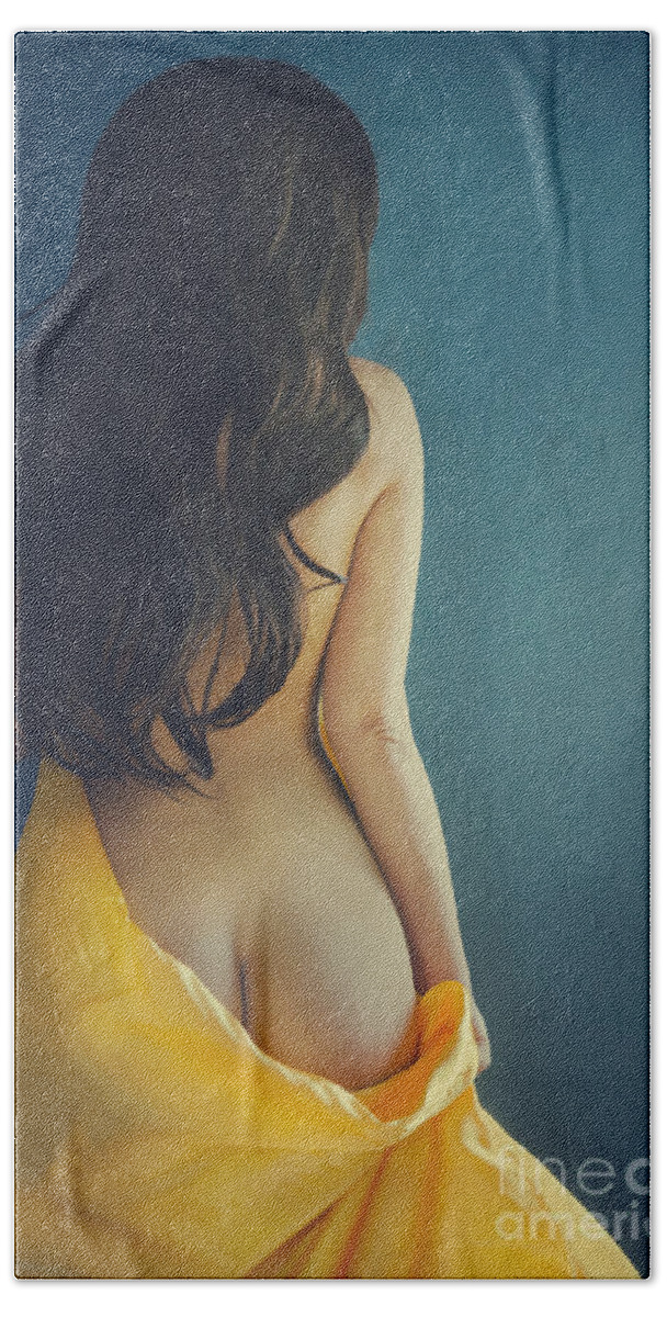 Woman Bath Towel featuring the photograph Woman with yellow silk on blue background by Jelena Jovanovic
