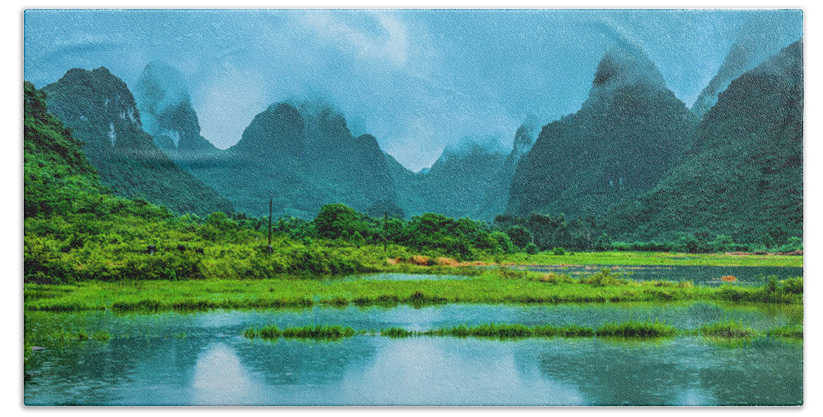 Karst Hand Towel featuring the photograph Karst rural scenery in raining #6 by Carl Ning