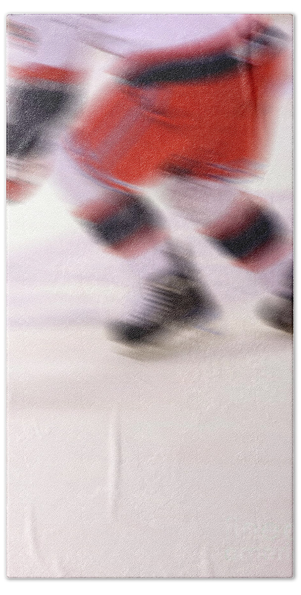 Hockey Bath Towel featuring the photograph A blur of Ice Speed by Karol Livote