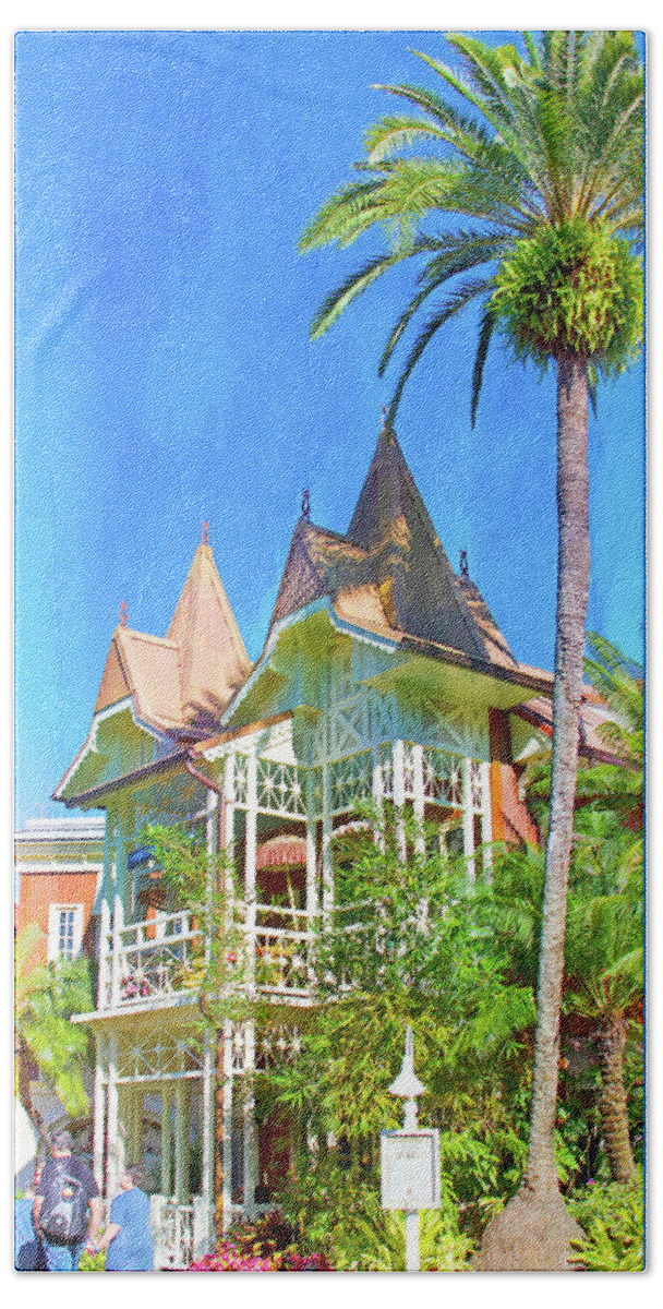 Magic Kingdom Hand Towel featuring the photograph A Day in Adventureland by Mark Andrew Thomas