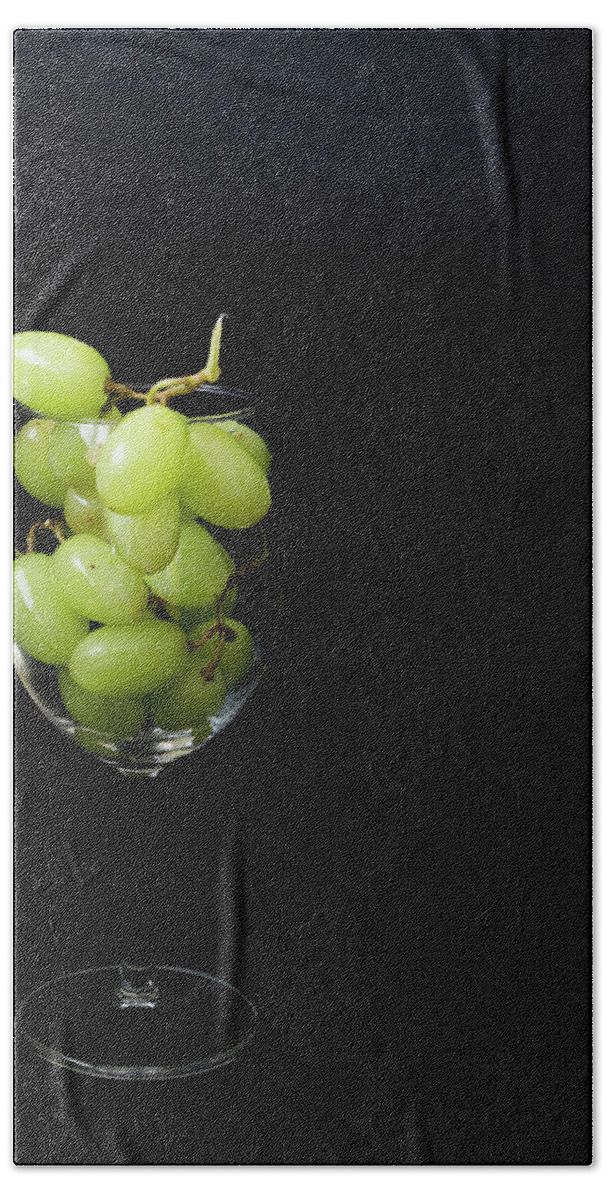Glass Hand Towel featuring the photograph A glass of white wine by Agnes Caruso