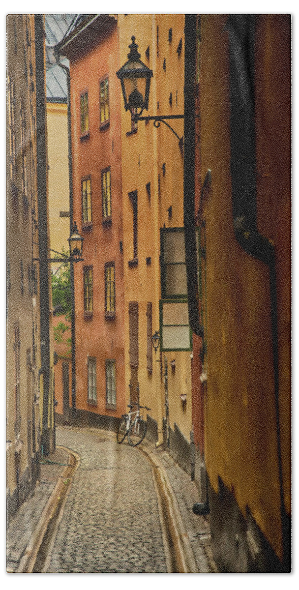 Stockholm Bath Towel featuring the photograph A Side Street in Stockholm by Mick Burkey