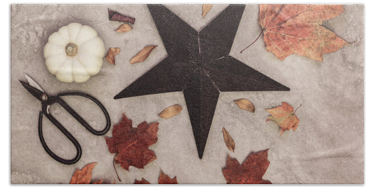 Star Bath Towel featuring the photograph A Star Among the Autumn Leaves by Kim Hojnacki