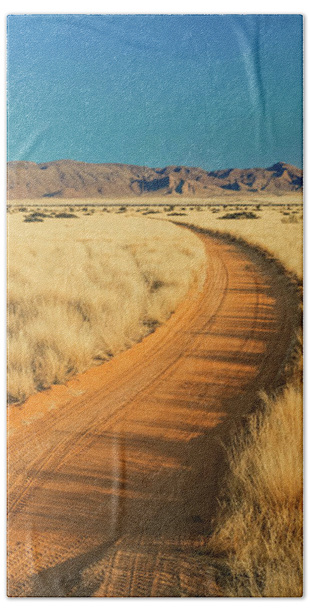 African Bath Towel featuring the photograph African sand road by Benny Marty