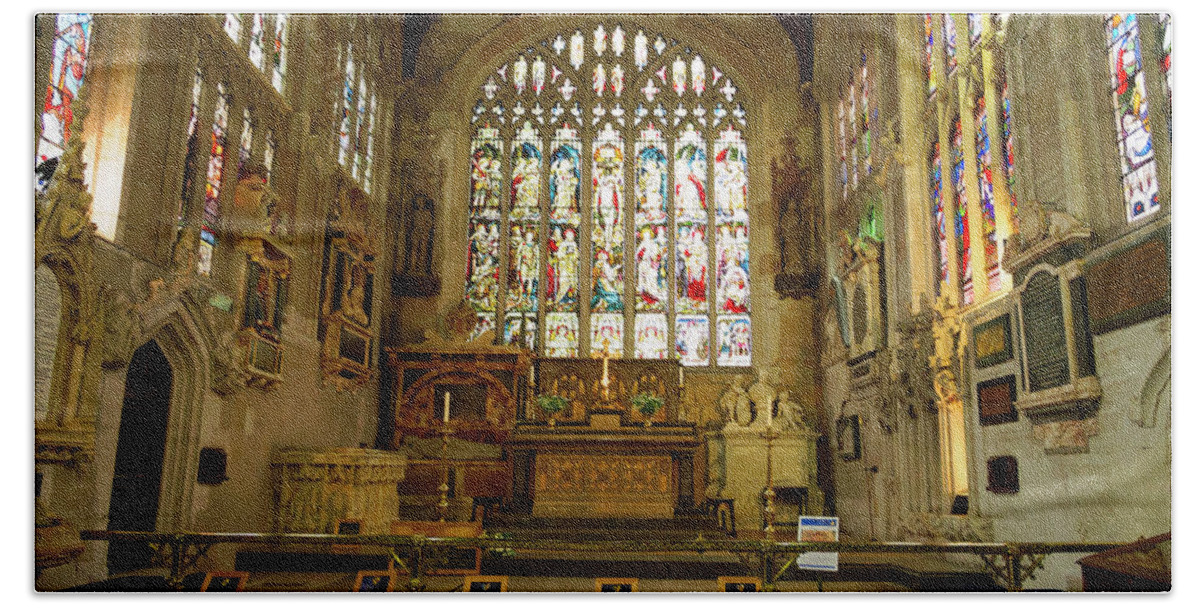 Altar Hand Towel featuring the photograph Altar and stained glass windows in Holy Trinity Church Stratford by Louise Heusinkveld