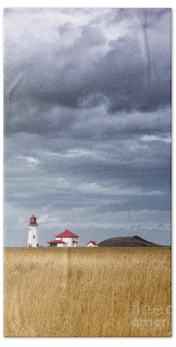 Quebec Bath Towel featuring the photograph Anse a la Cabane lighthouse on the Magdalen Islands by Jane Rix