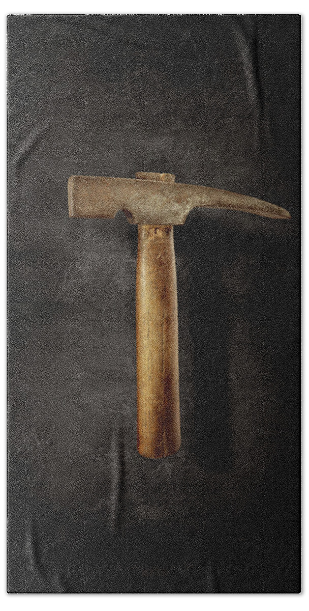 Hand Tool Bath Towel featuring the photograph Vintage Masonry Hammer on Black by YoPedro