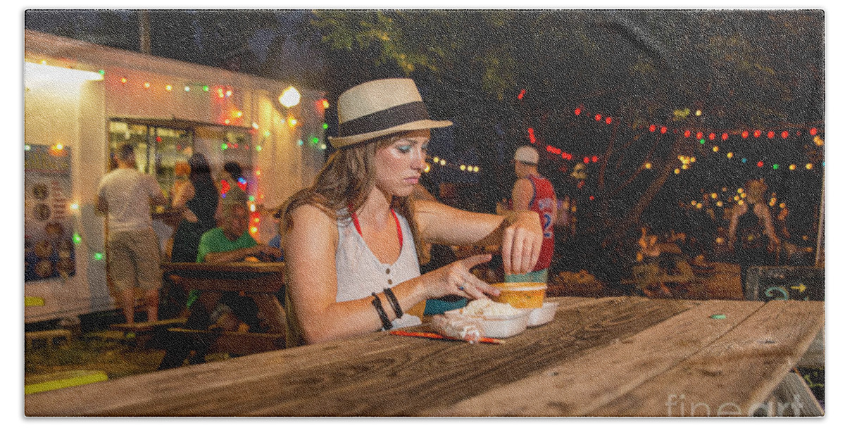 Attractive Hand Towel featuring the photograph Attractive local Austin woman resident eats at an East Austin food truck park by Dan Herron