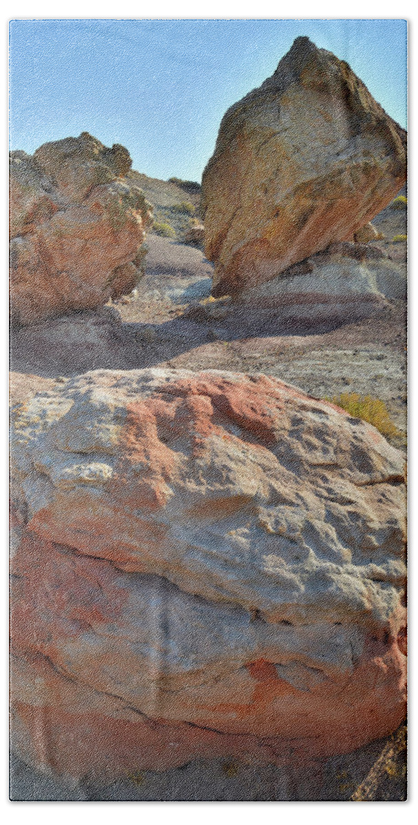 Grand Junction Hand Towel featuring the photograph Balanced Boulders in Bentonite Site by Ray Mathis
