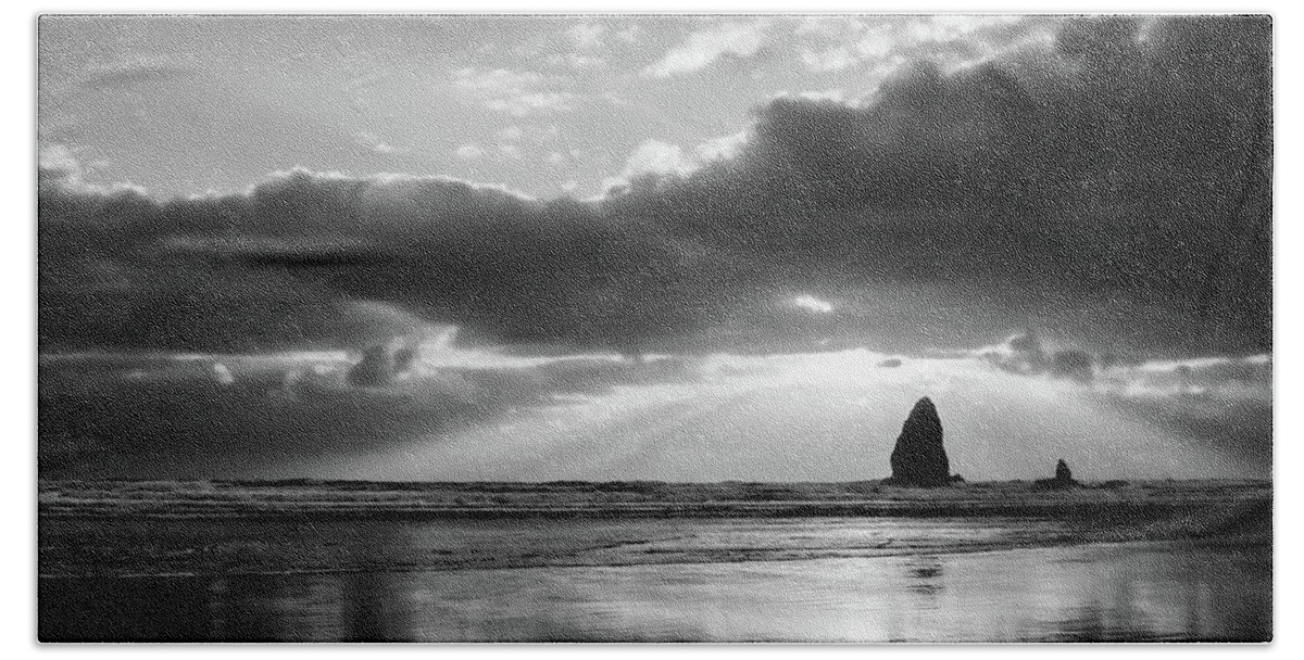 Cannon Beach Bath Towel featuring the photograph Basking in the Light BW by Don Schwartz