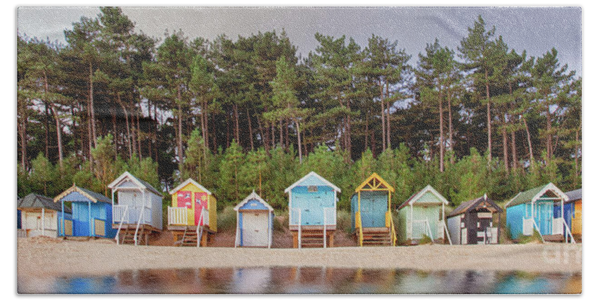 Wells Bath Towel featuring the photograph Beach hut row on the Norfolk coast by Simon Bratt