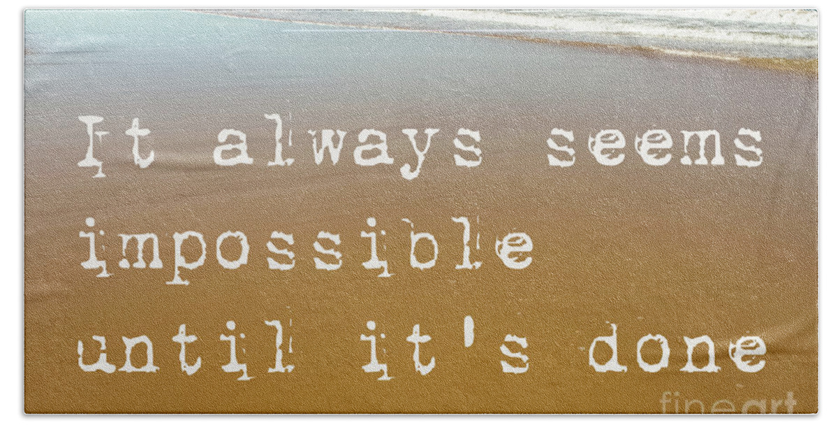 It Always Seems Impossible Until It's Done Bath Towel featuring the photograph Beach Scene of wet sand with waves in the background and the motivational quote it always seems impo by Susan Vineyard