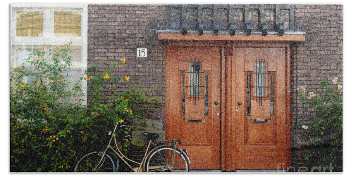Bicycle Hand Towel featuring the photograph Bicycle and Wooden Door by Thomas Marchessault