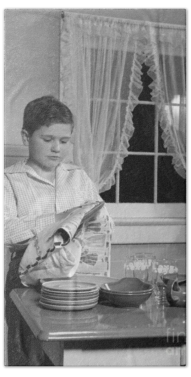 1950s Bath Towel featuring the photograph Boy Drying Dishes, C.1950s by H. Armstrong Roberts/ClassicStock