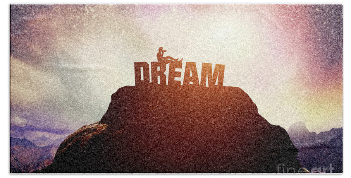 Dream Bath Towel featuring the photograph Boy sitting on a DREAM writing on the peak of a mountain. by Michal Bednarek