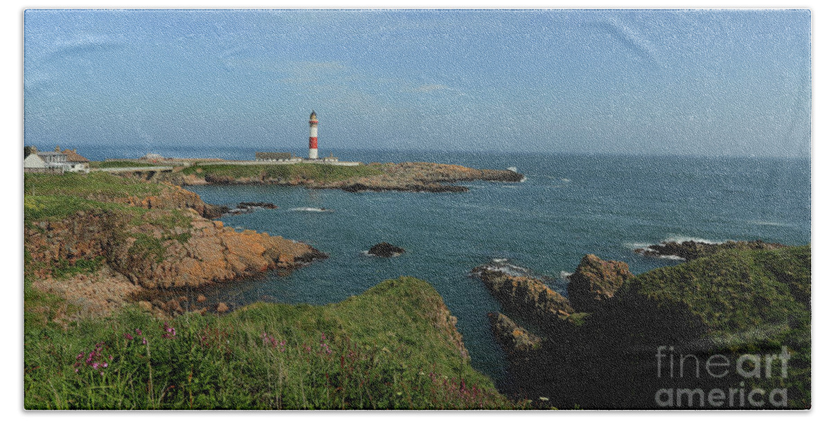 Boddam Lighthouse Hand Towel featuring the photograph Buchan Ness Lighthouse and the North Sea by Maria Gaellman
