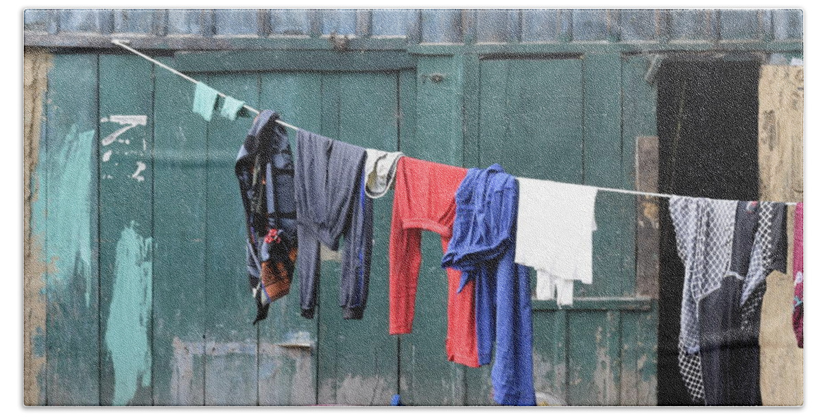 Clothes Bath Towel featuring the photograph By the rope by Sumit Mehndiratta