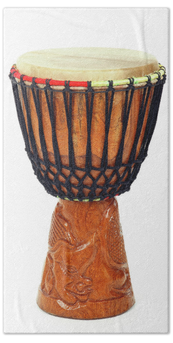 Djembe Bath Towel featuring the photograph Carved African djembe drum by GoodMood Art