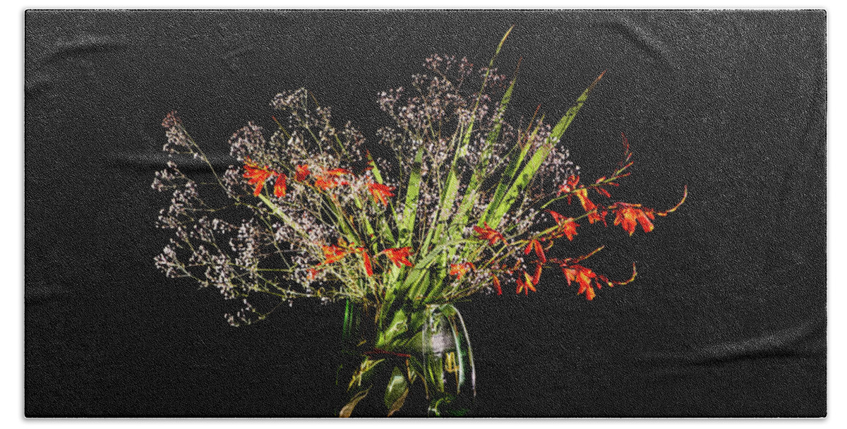 Baby's Breath Bath Towel featuring the photograph Cascade of white and orange. by Torbjorn Swenelius