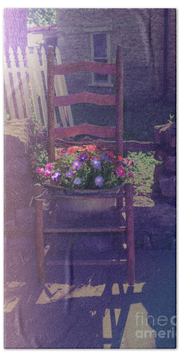 Flowers Bath Towel featuring the photograph Chair full of Flowers by Larry Braun