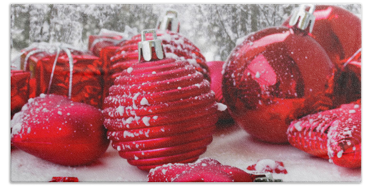 Christmas Bath Towel featuring the photograph Christmas Balls in Snow by Anastasy Yarmolovich