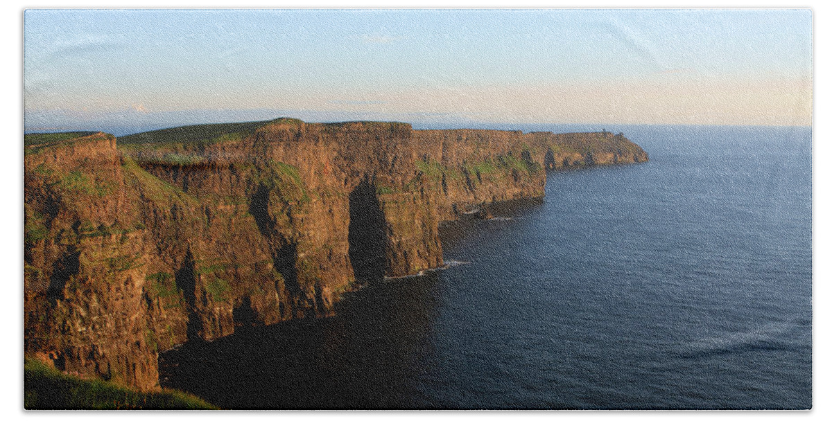 Ireland Bath Towel featuring the photograph Cliffs Of Moher In County Clare At Sunset by Aidan Moran