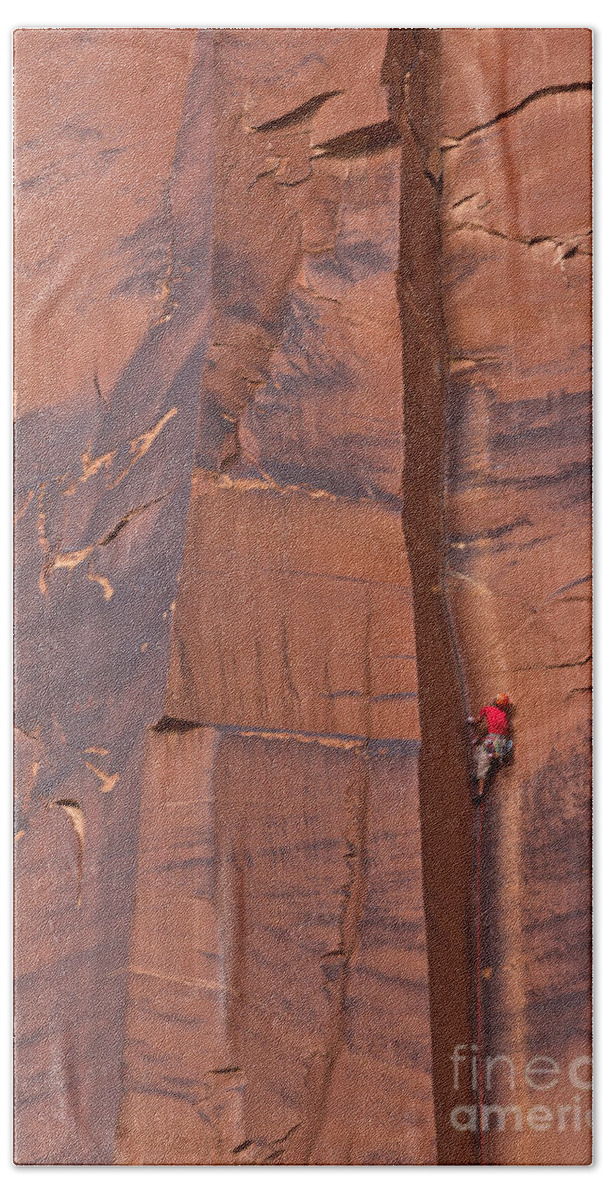 00559217 Bath Towel featuring the photograph Climber Indian Creek by Yva Momatiuk John Eastcott