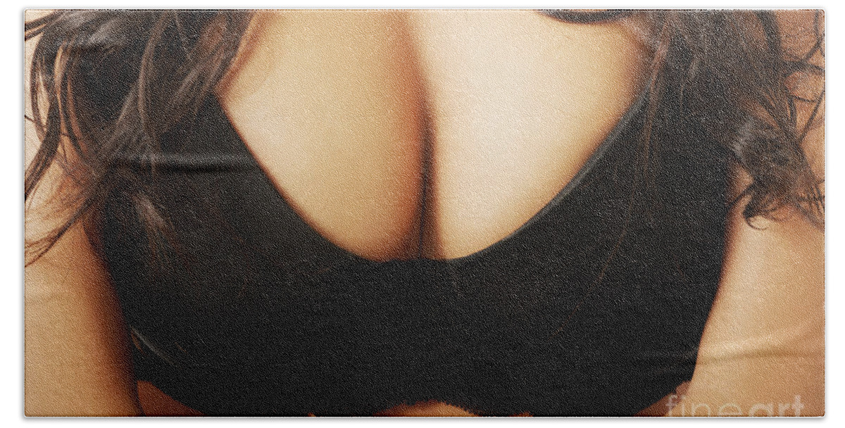 Close up on female boobs in black bra Hand Towel