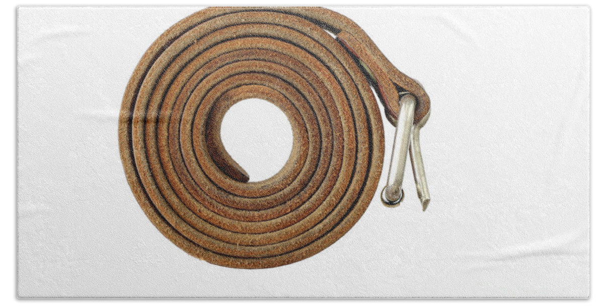 Coiled Bath Towel featuring the photograph Coiled leather belt on a white background by Michal Boubin