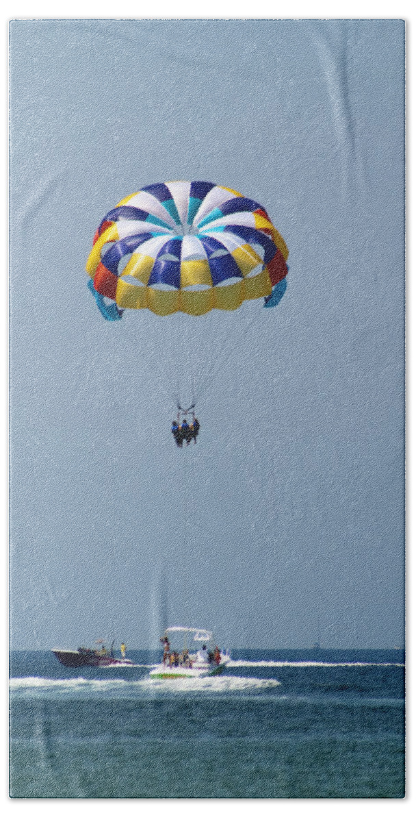 Parasailing Hand Towel featuring the photograph Colorful Parasailing by Kathy Clark