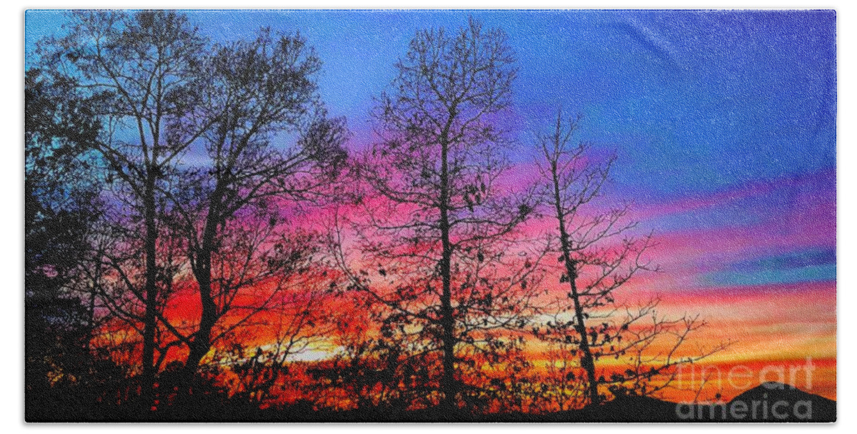 Woods Hand Towel featuring the photograph Colorful Sky by Brianna Kelly
