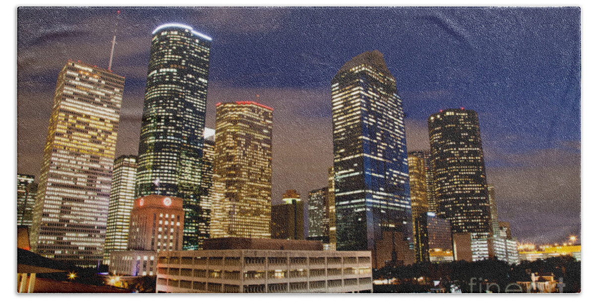Downtown Bath Towel featuring the photograph Downtown Houston at night by Olivier Steiner
