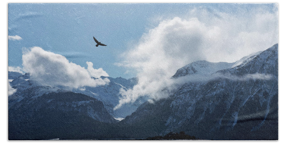 Alaska Bath Towel featuring the photograph Eagle flying over the Chilkat Inlet by Michele Cornelius