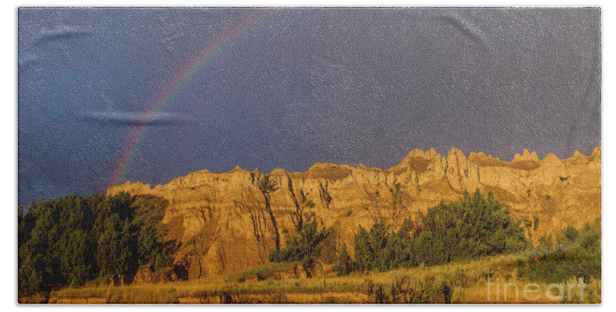 Badlands Hand Towel featuring the photograph End of the Rainbow by Karen Jorstad