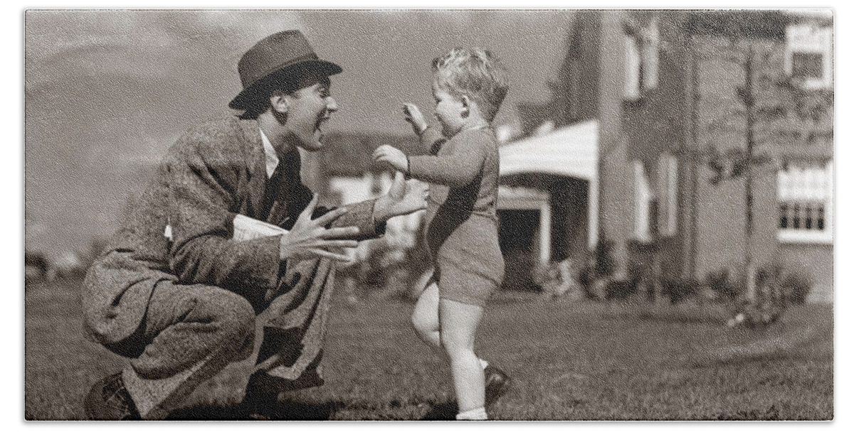 1940s Bath Towel featuring the photograph Father Greeting Son After Work, C.1940s by H. Armstrong Roberts/ClassicStock