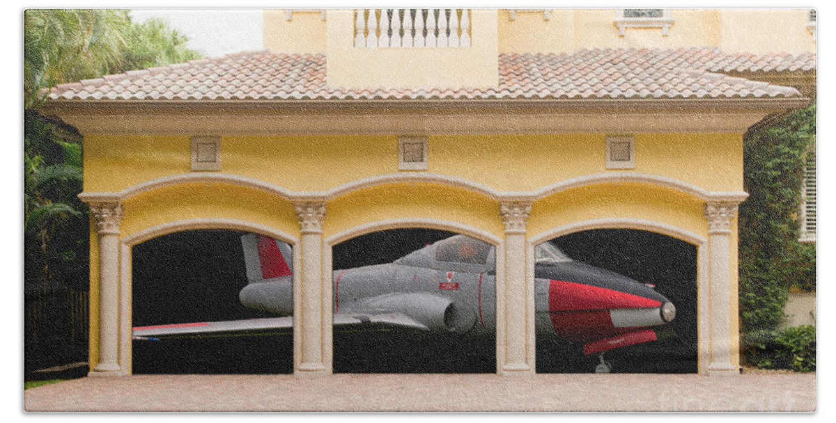 Triple Bath Towel featuring the photograph Fighter jet in a garage by Les Palenik