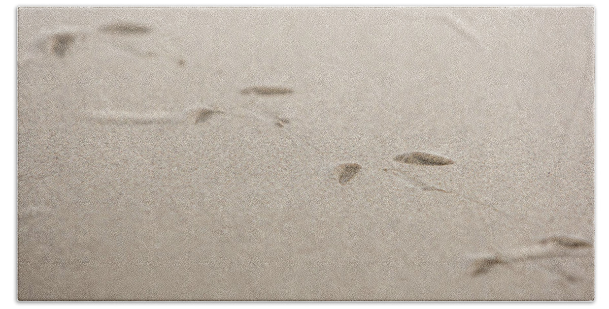 Sand Bath Towel featuring the photograph Foot prints in the sand by Jason Hughes